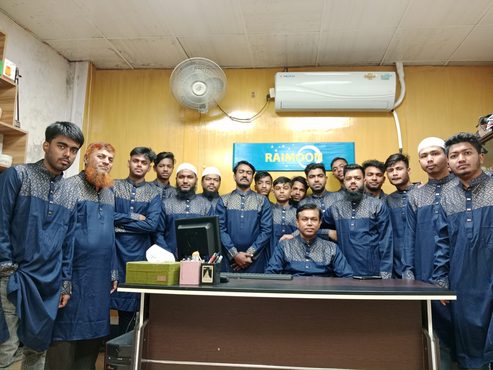 Group of people in matching outfits.